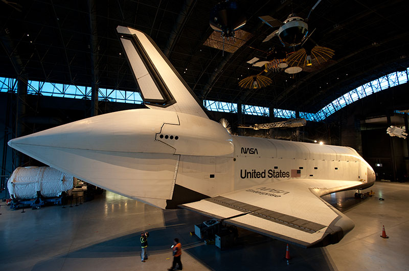 Final wheels stop: Space shuttle Discovery enters the Smithsonian