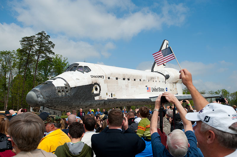 Final wheels stop: Space shuttle Discovery enters the Smithsonian