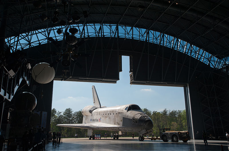 Final wheels stop: Space shuttle Discovery enters the Smithsonian