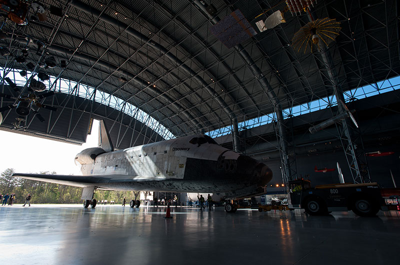 Final wheels stop: Space shuttle Discovery enters the Smithsonian