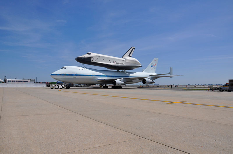 Space shuttle Enterprise hoisted off jumbo jet in New York