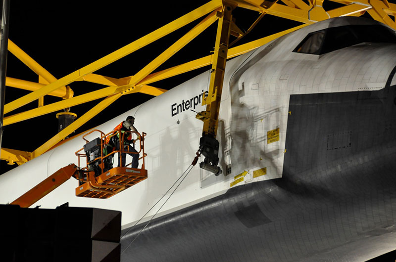 Space shuttle Enterprise hoisted off jumbo jet in New York