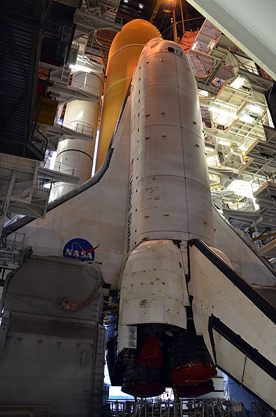 Final shuttle rolls out to launch pad as next-to-last lands