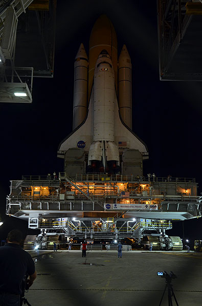 Final shuttle rolls out to launch pad as next-to-last lands