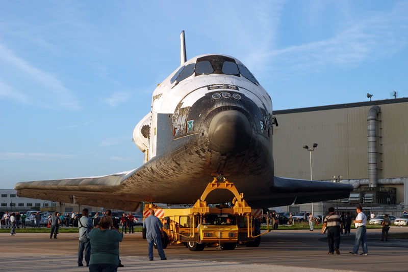 Space shuttle Discovery departs hangar for final flight