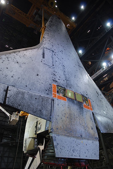 Shuttle Discovery mated with its final boosters and tank